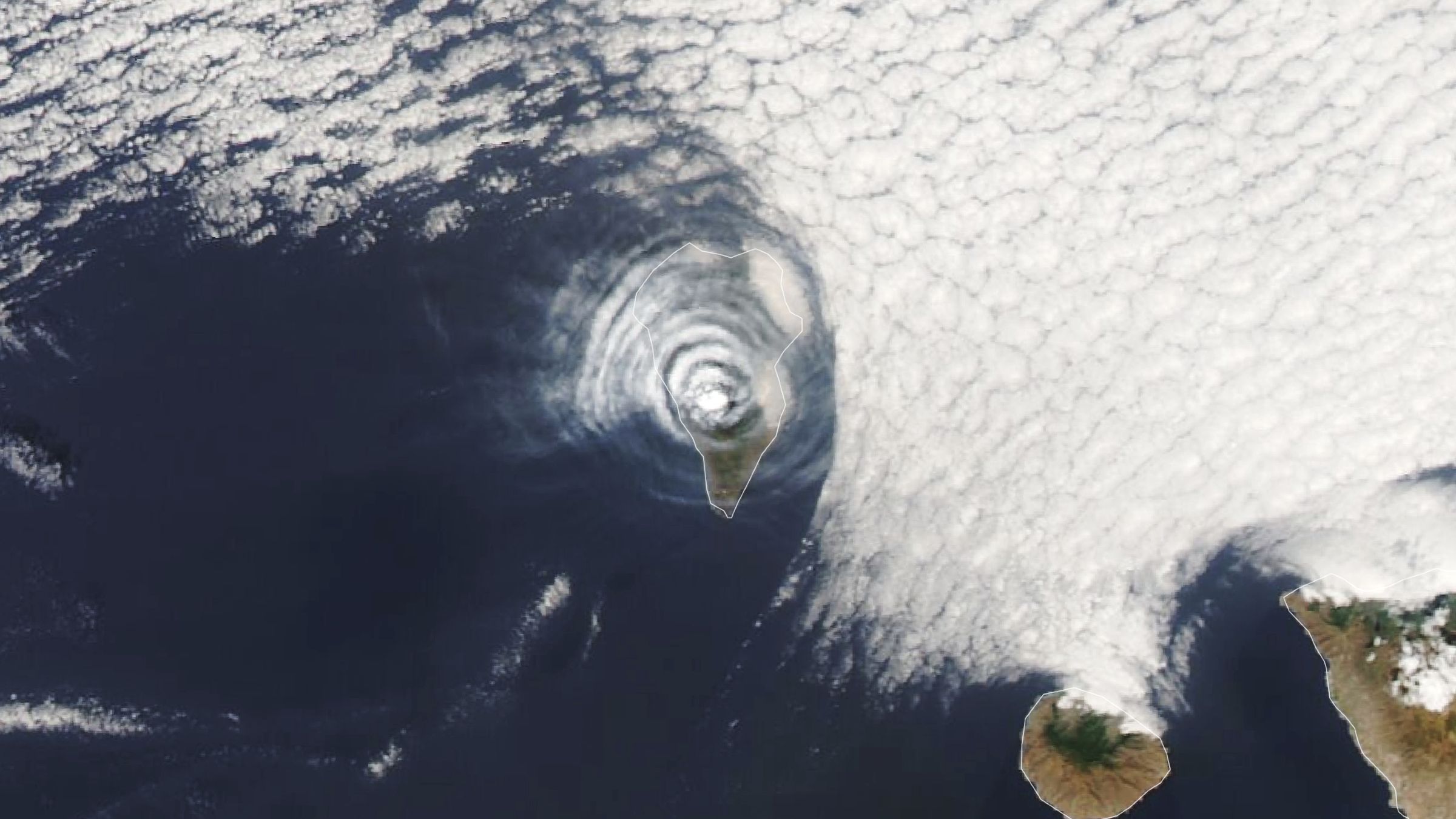 Bull's-Eye Cloud Rings Appear Above Erupting La Palma Volcano